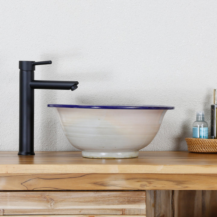 Lavabo sobre encimera azul redondo